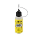 OTIS AIRGUN LUBRICANT yellow bottle with black cap and narrow applicator tip, front view