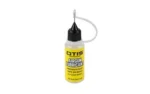 OTIS AIRGUN LUBRICANT yellow bottle with black cap and narrow applicator tip, front view