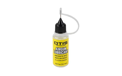 primary-3045 OTIS AIRGUN LUBRICANT yellow bottle with black cap and narrow applicator tip, front view