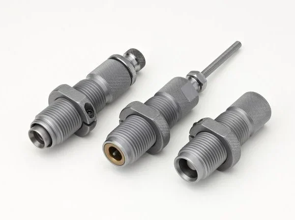 Hornady 3-Die Pistol Taper Crimp Die Set, three silver dies in an angled view