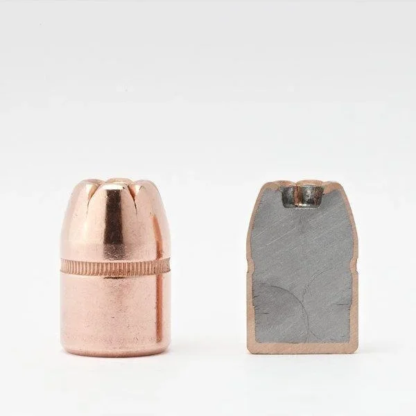Hornady XTP Magnum Handgun Bullets, copper bullet beside a cutaway showing the gray core