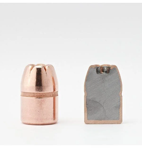 primary-30671 Hornady XTP Magnum Handgun Bullets, copper bullet beside a cutaway showing the gray core