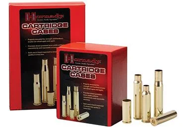 primary-30689 Hornady Unprimed Brass Rifle Cartridge Cases 7mm-08 Rem, loose brass cases beside red boxes