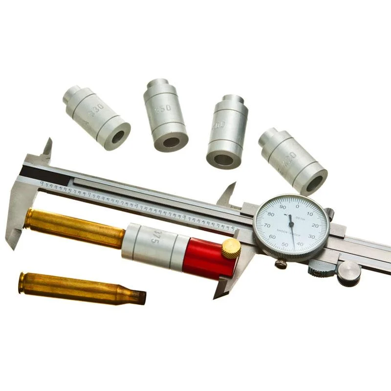 primary-30764 Hornady Lock-N-Load Headspace Kit with Body, bushings beside dial caliper and cartridge cases