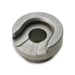 Hornady Reloading Shell Holder #49, silver circular holder in angled top view