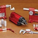 Hornady Lock-N-Load Precision Reloaders Accessory Kit, red tools and accessories arranged on table