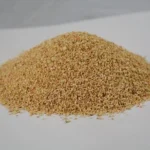 Mayville Engineering Co./Mec MEC Corn Media, mound of tan granular cleaning media