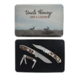 Uncle Henry Knife Combo with Tin, printed metal tin above two folding knives and one fixed knife
