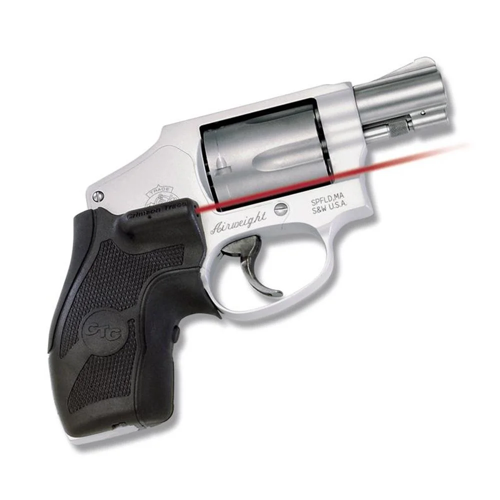 primary-33674 Crimson Trace Revolver Lasergrip, black grip mounted on a silver revolver with red laser beam visible