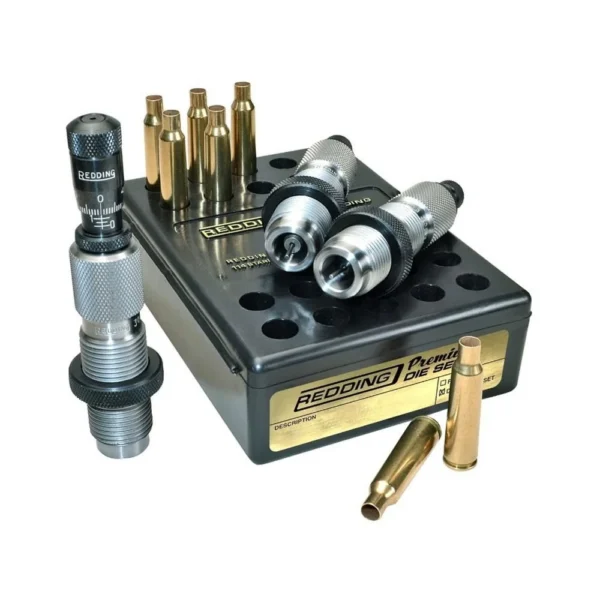 Redding Premium Series Deluxe 3-Die Set 6.5 PRC with three silver dies, case holder and brass cases