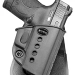 Fobus Evolution Series Retention Paddle Holster, black, holding a compact pistol