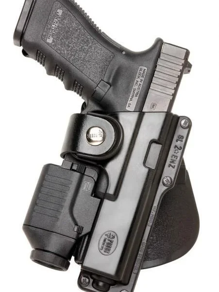 Fobus Paddle Holster for Glock 17/22/31, black holster holding a handgun with light
