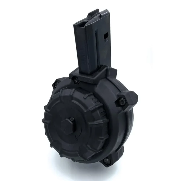 Promag AR-15 rifle magazine, black drum in angled front view with vertical feed tower