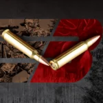 Barnes Ammunition Centerfire Rifle cartridges, two brass rounds with copper-coloured pointed bullets