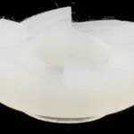Lee Hex Ratchets, stacked translucent white pieces viewed from above