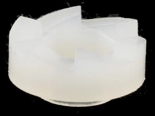 Lee Hex Ratchets, stacked translucent white pieces viewed from above