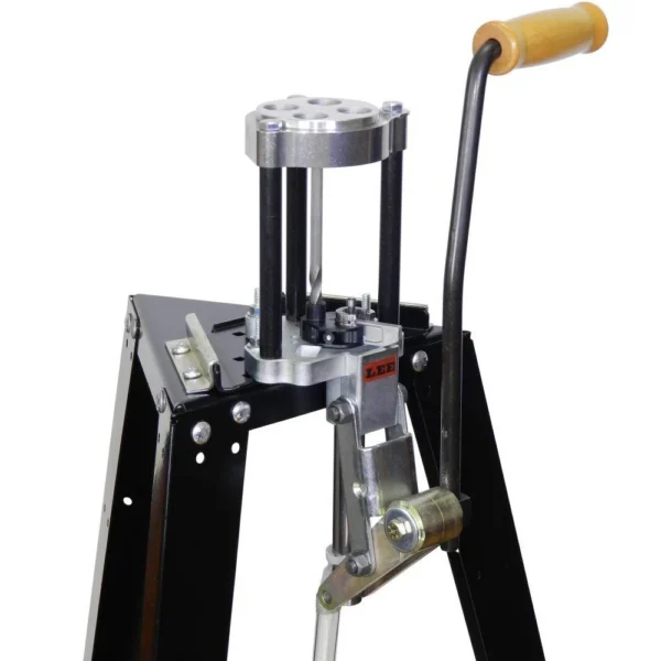 Lee 4 Hole Value Turret Press with Auto Index, angled front view with black frame and wood handle
