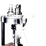 Lee Safety Prime, front view of silver and black press-mounted priming system