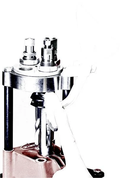 Lee Safety Prime, front view of silver and black press-mounted priming system