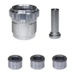 Lee App Bulge Buster Kit, silver metal die and four cylindrical components arranged on white