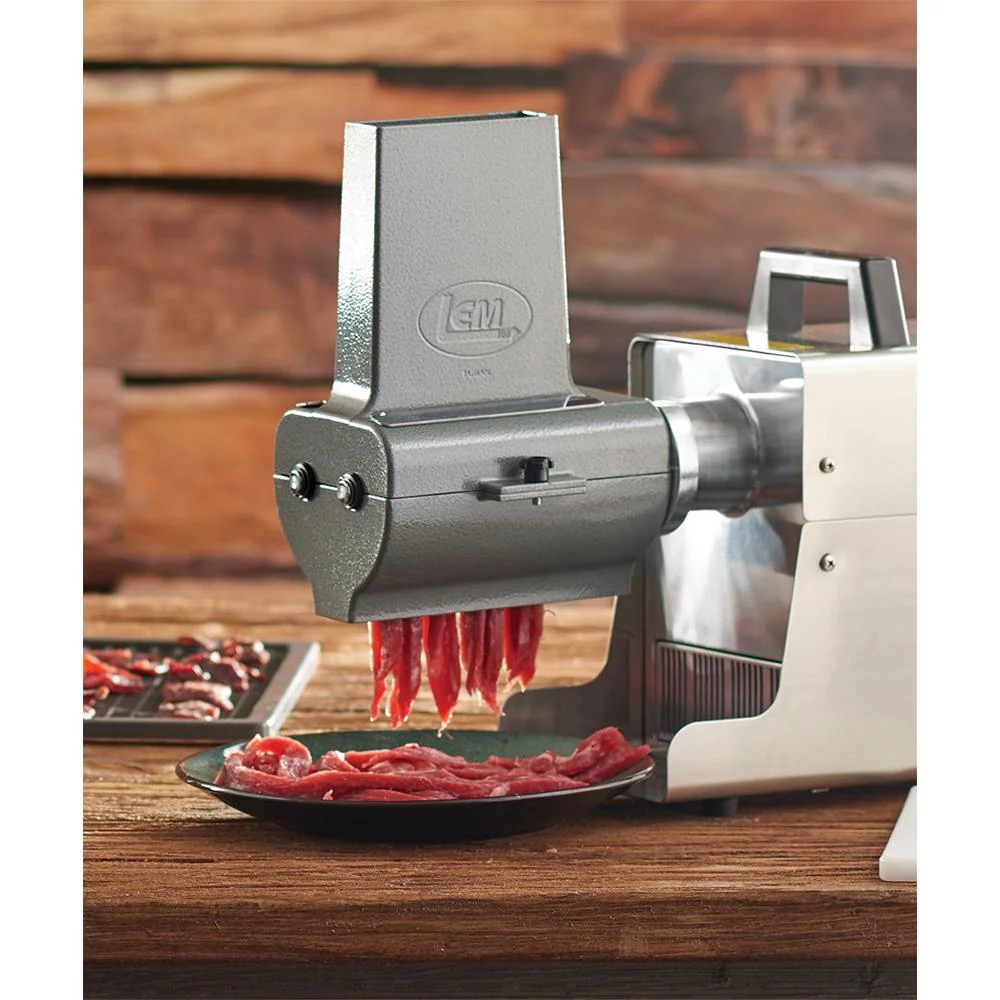 primary-40208 LEM Products Big Bite 2-in-1 Jerky Slicer/Tenderizer Attachment, mounted with meat strips exiting