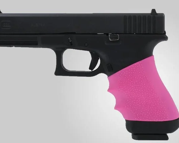 Hogue Grips HandAll Full Size Universal Grip Sleeve, pink finger-groove sleeve fitted on black handgun