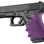 Hogue HandAll Beavertail Grip Sleeve, purple textured sleeve fitted to a black Glock pistol