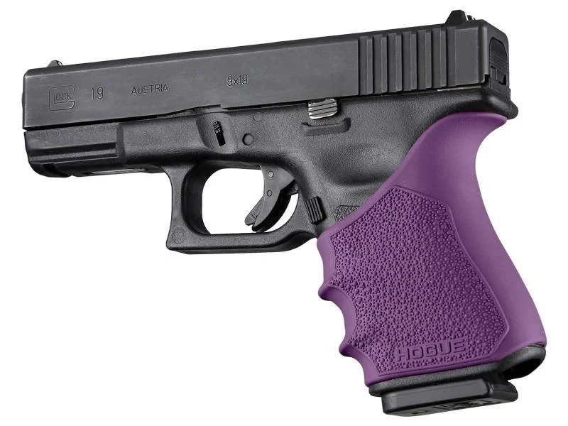 primary-40376 Hogue HandAll Beavertail Grip Sleeve, purple textured sleeve fitted to a black Glock pistol