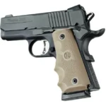 Hogue Rubber Officer's Flat Dark Earth W/FG, tan finger-groove grips mounted on black pistol