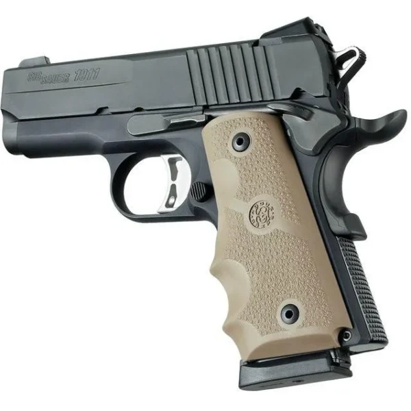 Hogue Rubber Officer's Flat Dark Earth W/FG, tan finger-groove grips mounted on black pistol