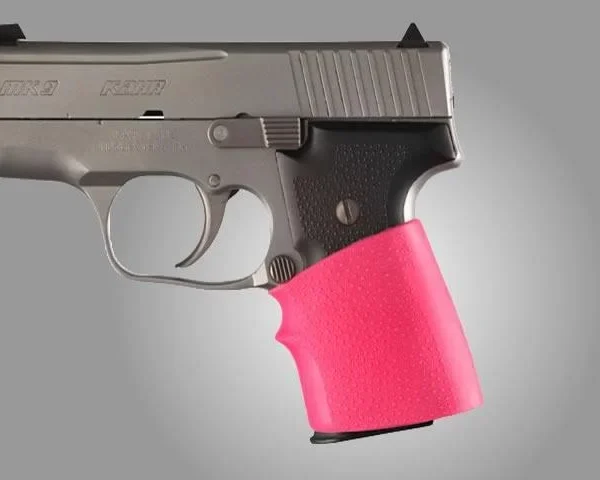 Hogue Grips HandAll Jr. pink grip sleeve, right-side view fitted to a handgun grip
