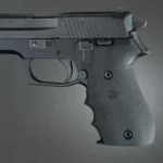 Hogue SIG Sauer P220 American Rubber Grips, black finger-groove grip installed on handgun