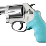 Hogue Rubber Bantam Style Grip in aqua, mounted on a silver revolver in left-side view