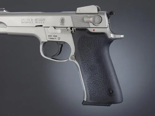 Hogue Grips S&W 5906 Rubber Grip, black textured grip mounted on a silver handgun