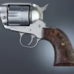 Hogue Ruger Blackhawk/Vaquero Walnut Classic Cowboy Action Wood Grips mounted on a silver revolver