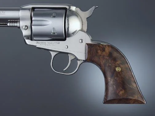 Hogue Ruger Blackhawk/Vaquero Walnut Classic Cowboy Action Wood Grips mounted on a silver revolver