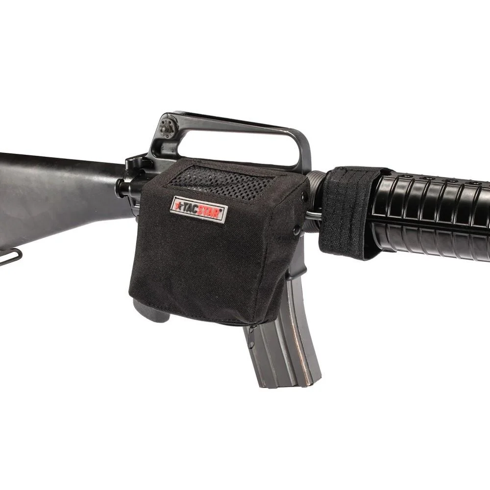 primary-40718 Tacstar Universal Brass Catcher black shell catcher mounted beside a rifle receiver