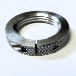 Forster 1-1/4 Crossbolt Die Lock Ring silver top view with threads and knurled edge