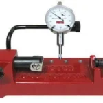 Forster Co-Ax Case and Cartridge Inspector, red base with black rollers and dial gauge