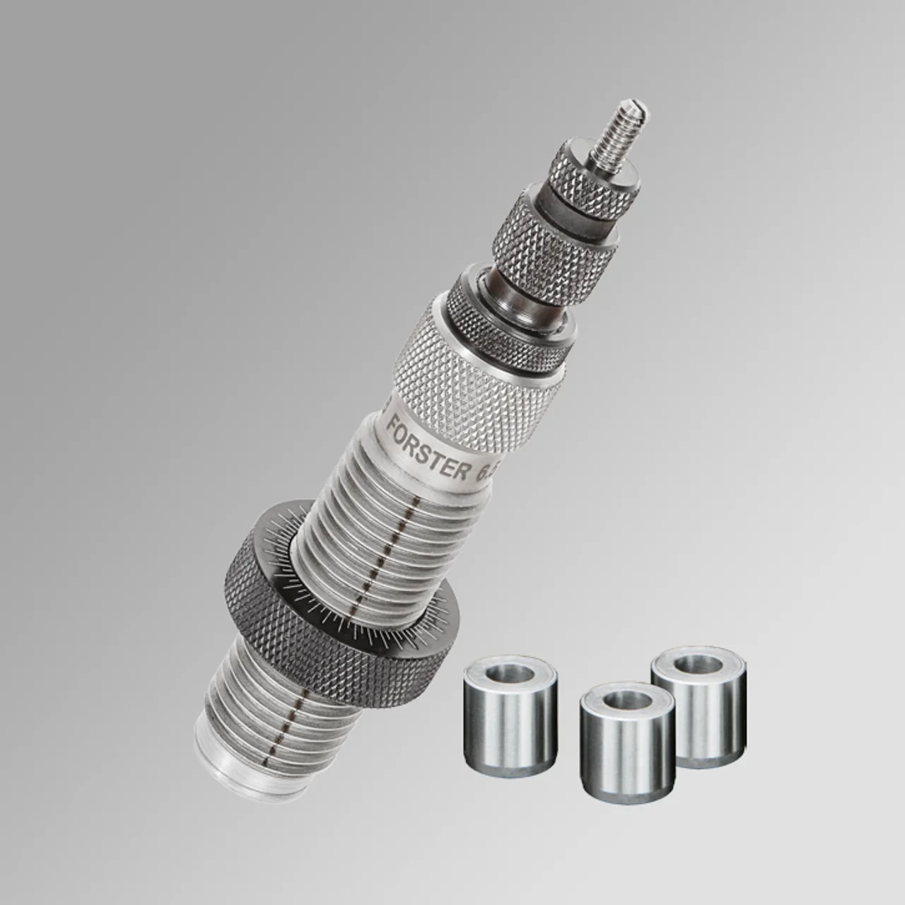 primary-41020 Forster 6.5 PRC Bushing Full Length Sizer Die Kit, angled silver die with three bushings