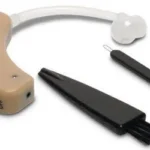 Walker's Ultra Ear Behind-The-Ear Hearing Amplifier, beige device with tube, brush and tool