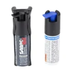 SABRE Quick Grip Pepper Spray Black, black grip canister beside refill with blue actuator