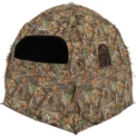 Ameristep Doghouse Fire Retardant Dog Blind, front view in Mossy Oak camouflage with open window