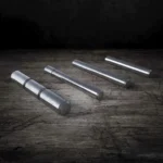 Rival Arms Frame Pin Set for Glock GEN3, three stainless steel pins on a dark surface