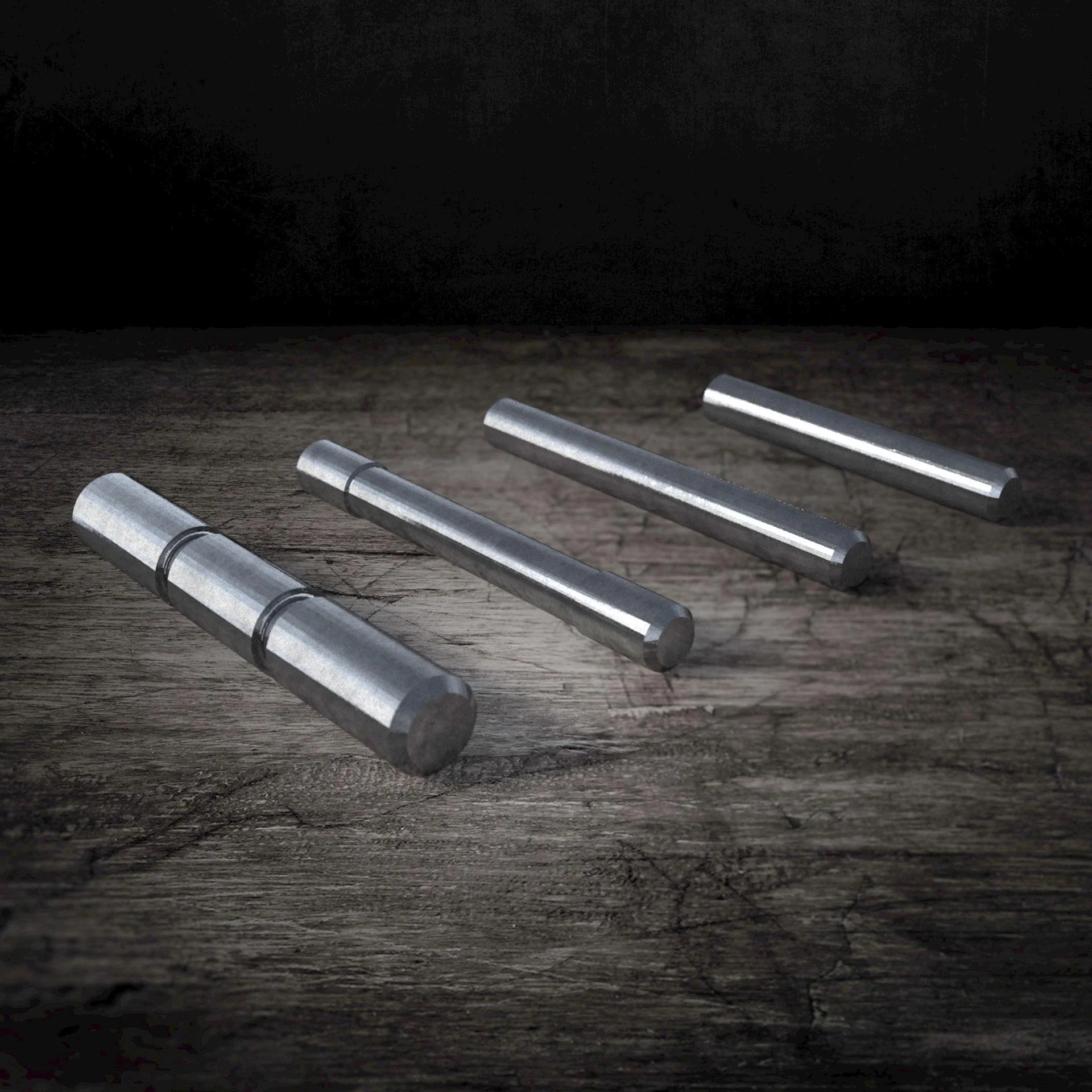 primary-41553 Rival Arms Frame Pin Set for Glock GEN3, three stainless steel pins on a dark surface