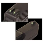Truglo Tritium Night Sights, close-up views of green front and rear sight dots mounted on a pistol
