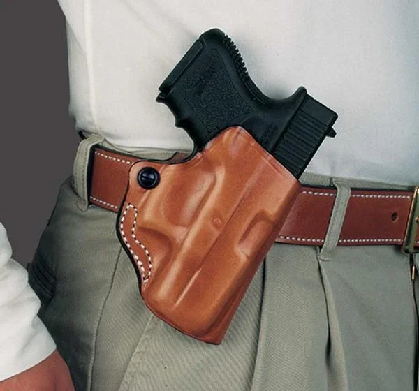 DeSantis Style 019 Mini Scabbard, tan right-hand belt holster holding a black handgun