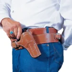 DeSantis Doc Holliday Cross Draw Holster, tan leather holster worn on a matching belt