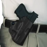 DeSantis Style 019 Mini Scabbard, black right-hand holster worn on belt with handgun