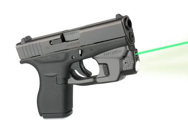 LaserMax CenterFire Light & Laser with GripSense, black handgun right-side view with green beam